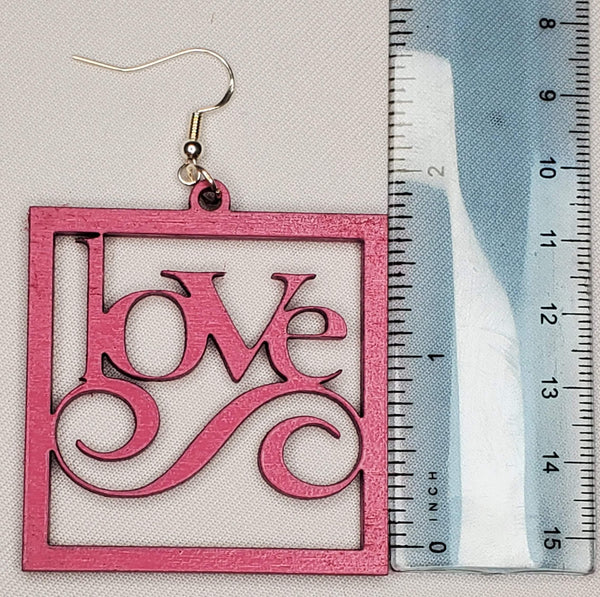 Pink square earring with the word love in the middle.  1 1/12 in H x 1 1/12 W